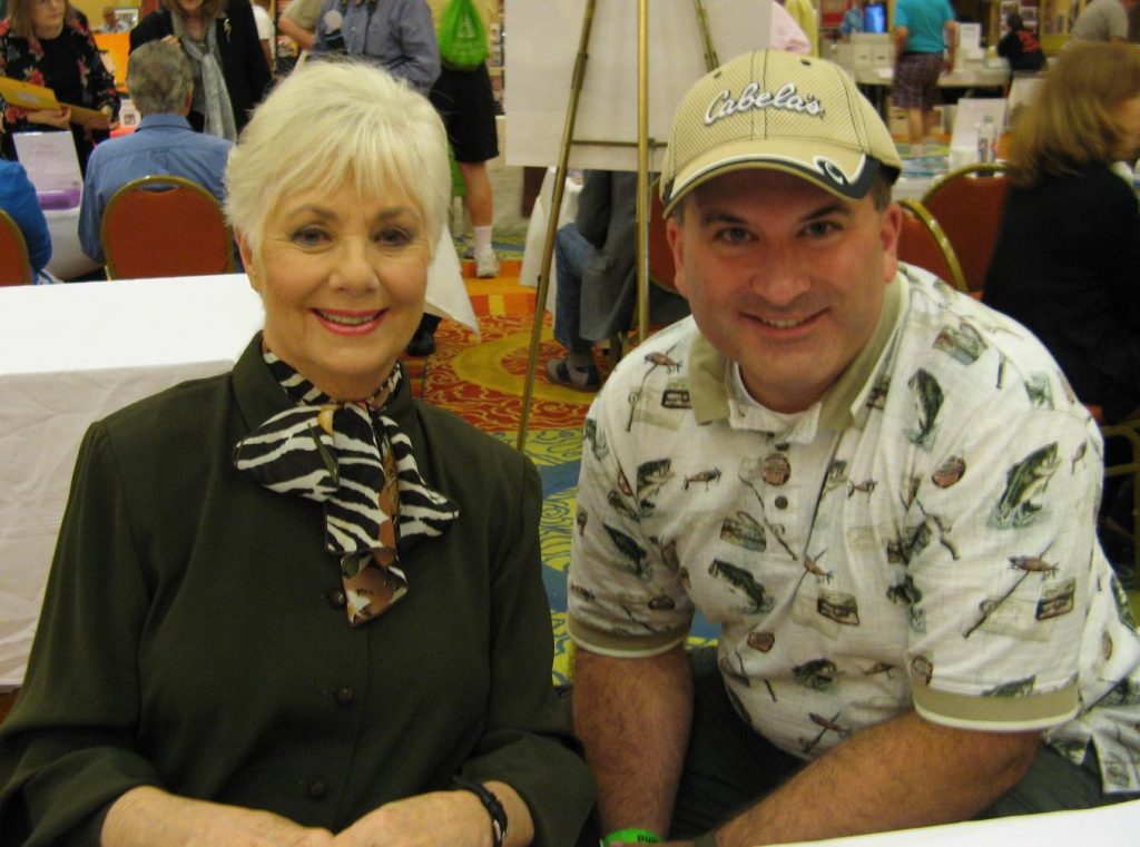 Shirley Jones poses for photos and signs autographs.